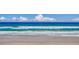 Stunning panoramic view of ocean waves rolling onto sandy beach at 2403 S Atlantic Ave # 309, Daytona Beach, FL 32118