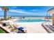 Inviting community pool with ocean views and ample lounge chairs at 2403 S Atlantic Ave # 309, Daytona Beach, FL 32118