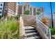 Exterior stairs leading to condo building at 2403 S Atlantic Ave # 309, Daytona Beach, FL 32118