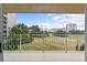 Private balcony offering scenic views of the community and beyond at 4 Oceans West Blvd # 206C, Daytona Beach, FL 32118