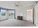 Bedroom with balcony access and partial water view at 4 Oceans West Blvd # 206C, Daytona Beach, FL 32118