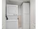 Convenient laundry closet with stackable washer and dryer at 4 Oceans West Blvd # 206C, Daytona Beach, FL 32118