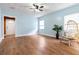 Spacious living room with light blue walls and hardwood floors at 67 Ormond Shores Dr, Ormond Beach, FL 32176