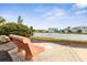 Relaxing park bench overlooking scenic pond at 67 Ormond Shores Dr, Ormond Beach, FL 32176