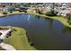 Tranquil pond with fountain in community setting at 67 Ormond Shores Dr, Ormond Beach, FL 32176