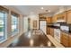 View of kitchen with island, appliances, and wood cabinets at 718 Casper Ave, Port Orange, FL 32129