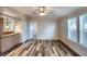 Living room features neutral walls and ceiling fan at 718 Casper Ave, Port Orange, FL 32129