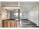 Living room with wood-look flooring and open layout at 718 Casper Ave, Port Orange, FL 32129