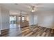 Open living area with wood-look floors and high ceilings at 718 Casper Ave, Port Orange, FL 32129