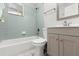 Updated bathroom with new vanity and bathtub at 825 Magnolia Ave, Holly Hill, FL 32117