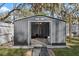 Large storage shed with ramp access at 825 Magnolia Ave, Holly Hill, FL 32117