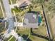 Aerial view showing house, pool, and backyard at 92 Spinnaker Cir, South Daytona, FL 32119