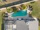 Aerial view of house and pool from above at 92 Spinnaker Cir, South Daytona, FL 32119