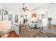 Cozy living room with gray sofas, coffee table, and ceiling fan at 92 Spinnaker Cir, South Daytona, FL 32119