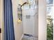 Convenient outdoor shower with privacy screen and storage at 92 Spinnaker Cir, South Daytona, FL 32119