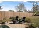 Private patio with seating area adjacent to the pool at 92 Spinnaker Cir, South Daytona, FL 32119