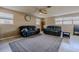 Relaxing living room featuring two sofas and a ceiling fan at 1214 Margina Ave, Daytona Beach, FL 32114