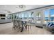 Bright dining area with water views and access to deck at 1778 John Anderson Dr, Ormond Beach, FL 32176