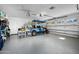 Large garage with golf cart and plenty of storage at 1778 John Anderson Dr, Ormond Beach, FL 32176