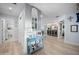 Hallway with light blue walls and light wood floors at 1778 John Anderson Dr, Ormond Beach, FL 32176