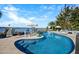 Inviting freeform pool with patio furniture at 1778 John Anderson Dr, Ormond Beach, FL 32176