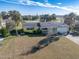 Aerial view of a single-Gathering home on a golf course at 200 Country Club Dr, Ormond Beach, FL 32176