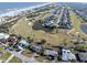 Aerial view showcasing the property's location near the ocean and golf course at 200 Country Club Dr, Ormond Beach, FL 32176