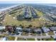 Aerial view highlighting the property's proximity to the beach and golf course at 200 Country Club Dr, Ormond Beach, FL 32176