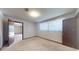 Bright bedroom with access to another room at 2050 Anne Cir, South Daytona, FL 32119