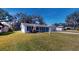 Ranch style home with a spacious yard at 2050 Anne Cir, South Daytona, FL 32119