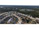 Aerial view of a residential neighborhood with houses and ponds at 2212 Oconnel Dr, Ormond Beach, FL 32174