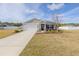 One-story house with a two-car garage and landscaping at 2212 Oconnel Dr, Ormond Beach, FL 32174