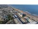 Aerial view of oceanfront property highlighting its location and beach access at 2850 Ocean Shore Blvd # 8, Ormond Beach, FL 32176