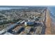 Aerial view of beachfront property with ocean views and nearby amenities at 2850 Ocean Shore Blvd # 8, Ormond Beach, FL 32176