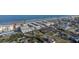 Aerial view of beachfront property showing ocean, beach, and multiple buildings at 2850 Ocean Shore Blvd # 8, Ormond Beach, FL 32176