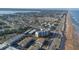 Aerial view showcasing the property's beachside location and surrounding area at 2850 Ocean Shore Blvd # 8, Ormond Beach, FL 32176