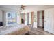 Bedroom with ocean view, ample closet space, and wood-look floors at 2850 Ocean Shore Blvd # 8, Ormond Beach, FL 32176