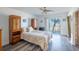 Main bedroom with ocean view, double bed and wood furniture at 2850 Ocean Shore Blvd # 8, Ormond Beach, FL 32176