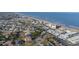 Wide aerial view of a beachfront condo complex with a red pin on the rooftop at 2850 Ocean Shore Blvd # 8, Ormond Beach, FL 32176