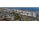 Aerial view of a beachfront condo complex with a red pin on the rooftop at 2850 Ocean Shore Blvd # 8, Ormond Beach, FL 32176