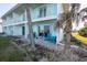 Charming patio with outdoor seating and direct access to the beach at 2850 Ocean Shore Blvd # 8, Ormond Beach, FL 32176