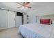 Main bedroom with sliding barn door and walk-in closet at 328 Dubs Dr, Holly Hill, FL 32117