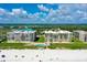 Aerial view of beachside condo complex with pool and ocean access at 4565 S Atlantic Ave # 5411, Ponce Inlet, FL 32127