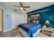 Bright bedroom with double bed, light wood floors, and built in closet at 4565 S Atlantic Ave # 5411, Ponce Inlet, FL 32127