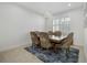 Formal dining room with a wooden table and six chairs at 508 High Tide Ln, Daytona Beach, FL 32124