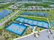 Aerial view of community tennis and pickleball courts at 508 High Tide Ln, Daytona Beach, FL 32124