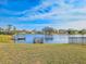 Peaceful lakefront property with two wooden docks at 840 Chickadee Dr, Port Orange, FL 32127