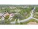 Aerial view of home near golf course and waterway at 100 Brown Pelican Dr, Daytona Beach, FL 32119