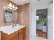Bright bathroom with a vanity, toilet and bathtub at 105 Park Cir, Daytona Beach, FL 32117