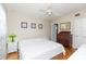 Bright bedroom with a queen-size bed and hardwood floors at 105 Park Cir, Daytona Beach, FL 32117